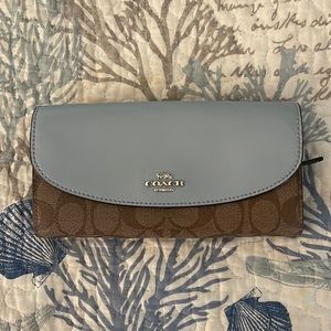 Light blue and brown large Coach wallet